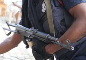 Ghana police officer with AK 47