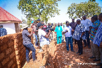 Dr Mahamudu Bawumia interacting with works at the third medical drone delivery service at Kukua