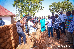 Dr Mahamudu Bawumia interacting with works at the third medical drone delivery service at Kukua