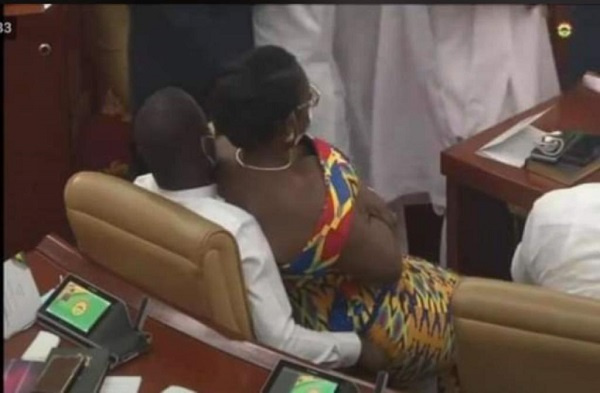 Ursula Owusu-Ekuful was seen sitting on the laps of Kwabena Mintah Akandoh