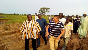 Mr. Salifu Saeed paid an unannounced visit to the disputed land