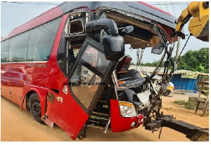 The mangled bus which carrying the students