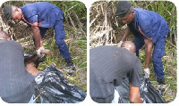 The decapitated body being removed from the bush by the Police