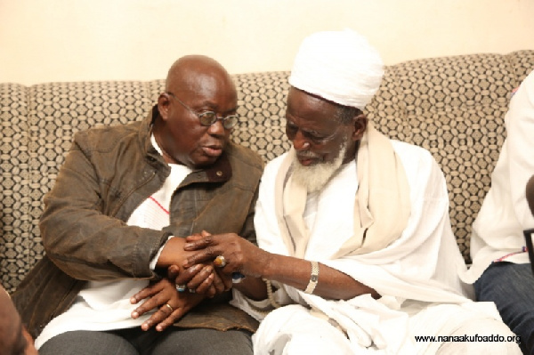 Akufo-Addo interacting with the Chief Imam