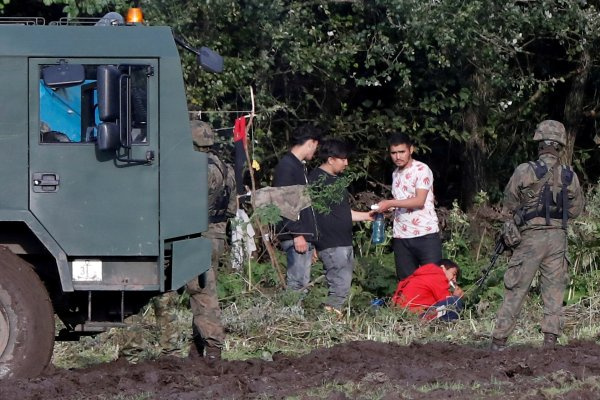 Polish border officials at the scene of the incident