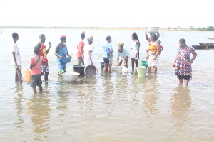 Residents fetching water from the dam