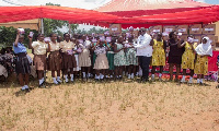 Some of the pupils display some of the sanitary pads they were given