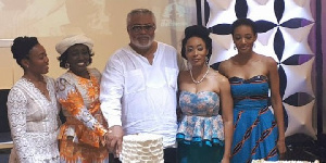 Former President John Rawlings with his family