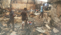 Old Fadama residents looking on their destroyed properties