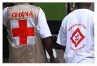 Some persons wearing a red cross society attire