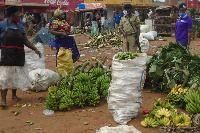 A policeman orders vendors to leave Balikyewunya Market in Luweero town