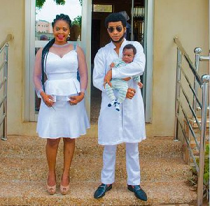 Joyce Dzidzor Mensah with her new husband and son