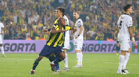 Andre Ayew celebrates his goal after his powerful header gave Fenerbahce the equaliser