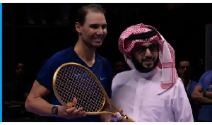 Rafael Nadal with a golden tennis racket