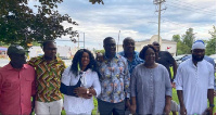 H.E. Atta Boafo Kingsley, fourth from left flanked by some attendees at the picnic