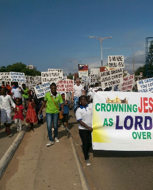 The group marching through the streets of Accra