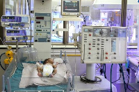 Baby lying in an incubator