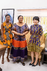 Mrs. Rebecca Akufo-Addo [C] with officials of Huawei