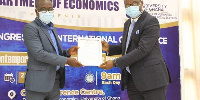 The award was presented to the Governor during the 2nd Department of Economics Alumni Congress