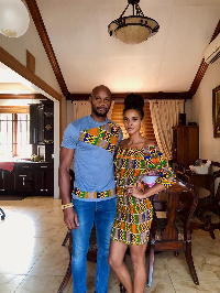 Asafa Powell and his wife