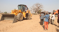 Ataogye performing the sod cutting