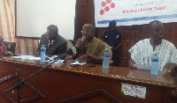 Simon Osei-Mensah (middle) speaking at the launch