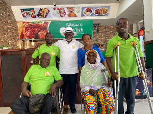 Azumah Nelson with some of the physically-challenged persons