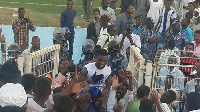 Ghanaian defender Abeiku Ainooson is mobbed