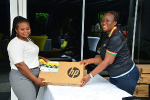 MTN Bright Scholarship Beneficiary Receiving A Laptop And Airtime From Cynthia 5