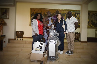 His Majesty Asantehene Otumfuo Nana Osei Tutu II with reps of Adidas