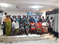 Participants in a shot with Gladys Adusah