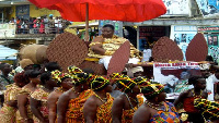 A Queenmother being carried during a Fetu Afahye