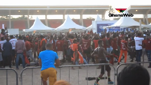 Past and current students charging at the Independence Square