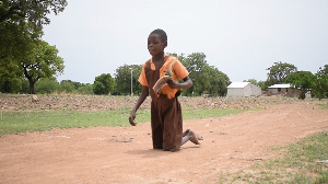 Agnes crawls on her knees to school everyday