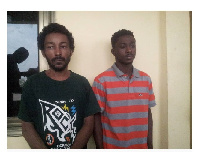 Philip Larbi (Ghanaian) and Sam Akai (Liberian) are the suspects