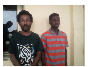 Philip Larbi (Ghanaian) and Sam Akai (Liberian) are the suspects