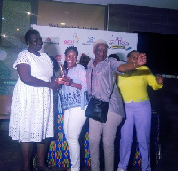 A Kenyan golfer picks up her award