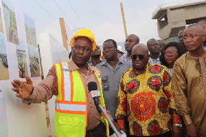 President Akufo-Addo inspecting progress of work on the footbridges