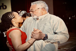 Zanetor Agyeman-Rawlings dancing with her father