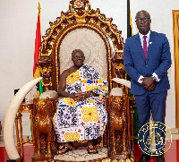 Otumfuo Osei Tutu II (left) and Dr. Otchere Addai-Mensah (right)