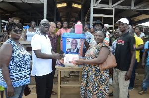 Joseph Mensah making the donation