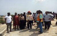 Adwoa Safo with some contractors inspecting projects