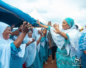 Samira Bawumia waving at a crowd of women