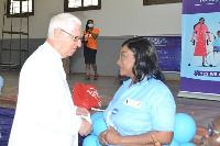 Dr Augustina Naami with Rev Father Andrews Campbell