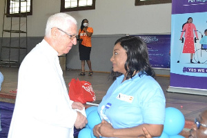 Dr Augustina Naami with Rev Father Andrews Campbell