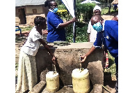 Rev Samuel George Bogere Egesa (right), commissioning the gravity water scheme