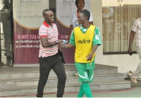 Aduana Stars winger Richard Mpong with Assistant coach of Kotoko Micheal Osei