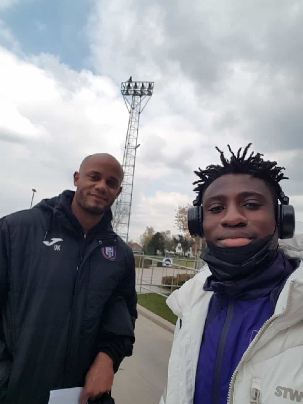 Ghanaian midfielder Christian Nfodjo with Anderlecht coach Vincent Kompany