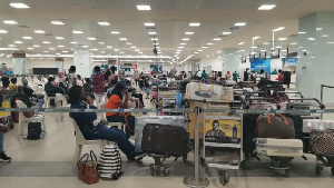 Some Of The Domestic Workers Going Through Formalities At KIA In Accra 696x393