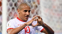 Wahbi Khazri's deflected free-kick earned Tunisia a 1-1 draw in Group E